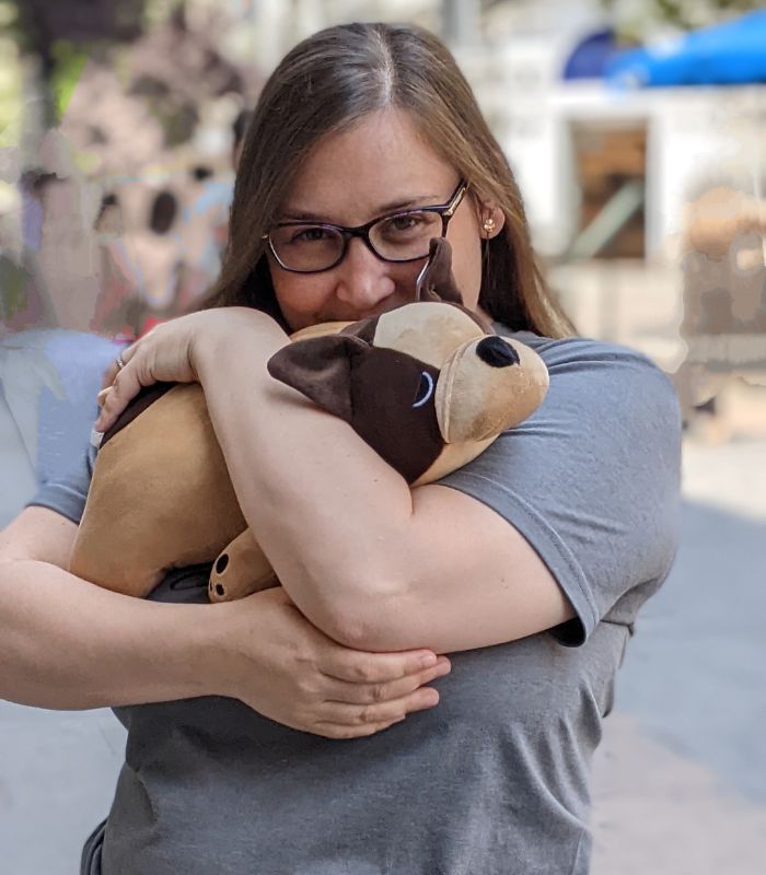 Emily Holding Stuffed Dog Toy